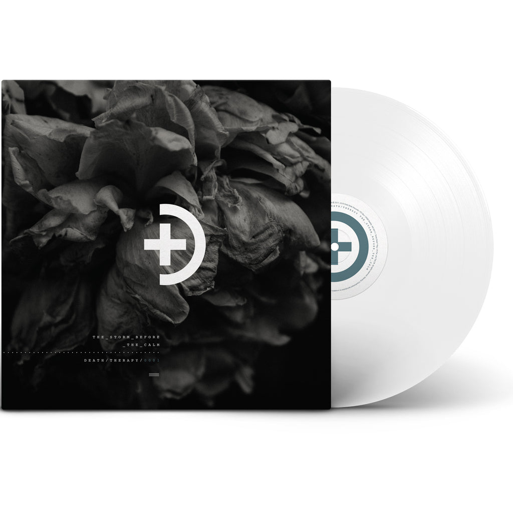 image of a white vinyl record on the right. cover is on the left. cover is black and has a plus sign and a half circle in the center,