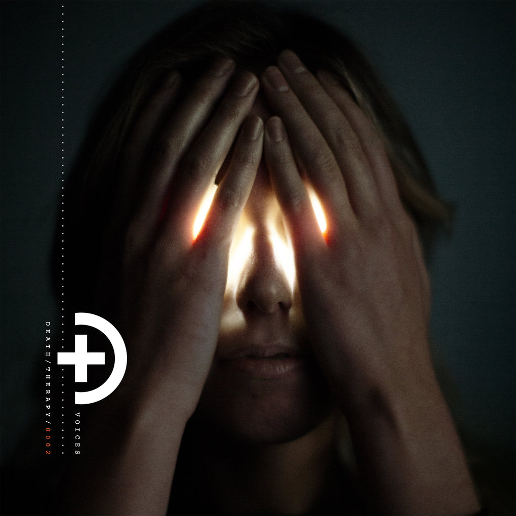 image of an album cover of a person with their hands covering their eyes. the eyes are glowing. small plus sign and half circle on the bottom left