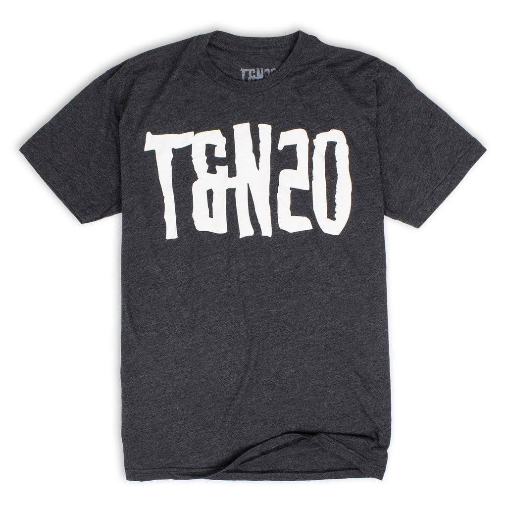 image of a dark heather grey tee shirt on a white background. tee has a full chest print in white that says T&N20
